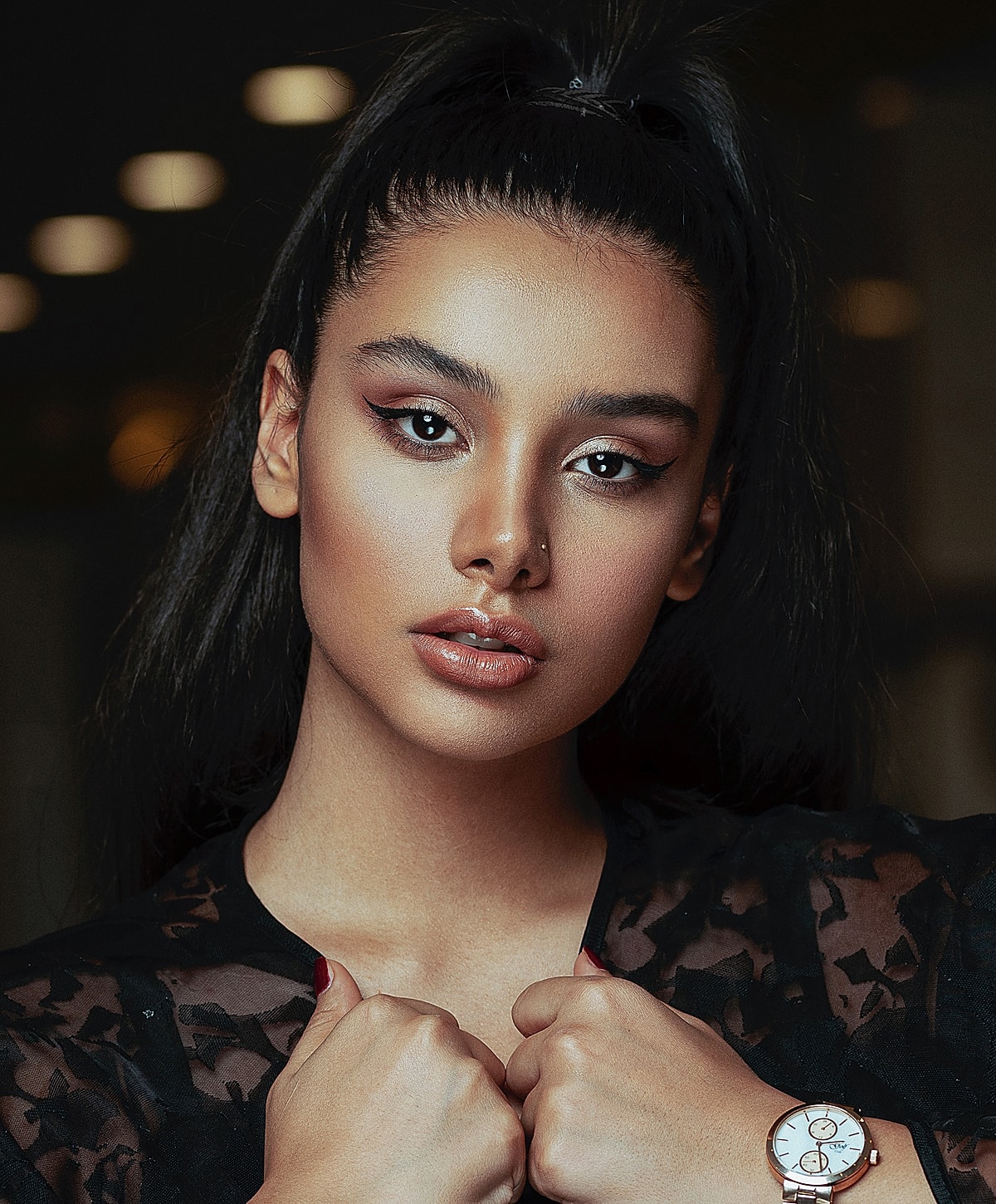 Portrait of a woman with striking makeup.
